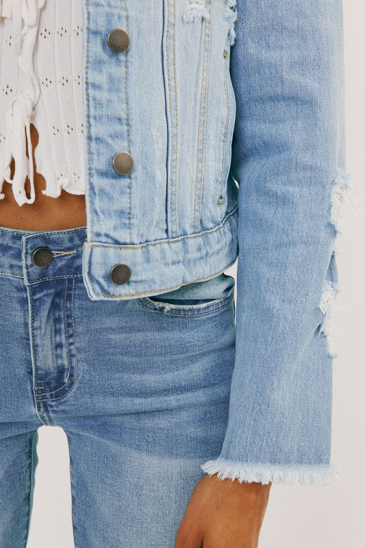 light wash distressed denim jacket