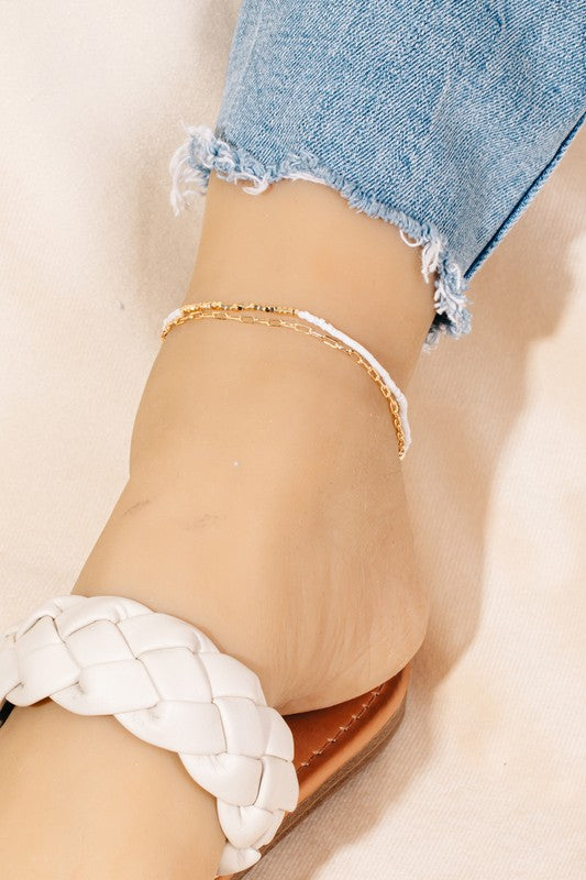 white and gold beaded anklet