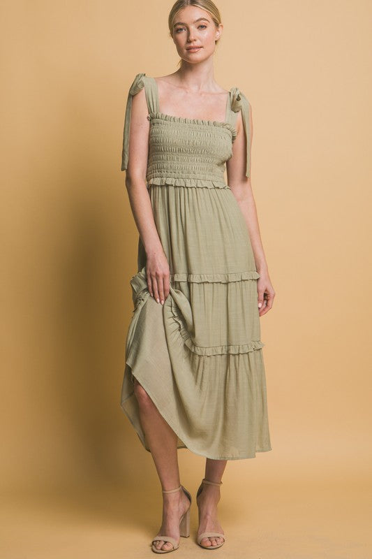 solid green sleeveless smocked fit and flare dress