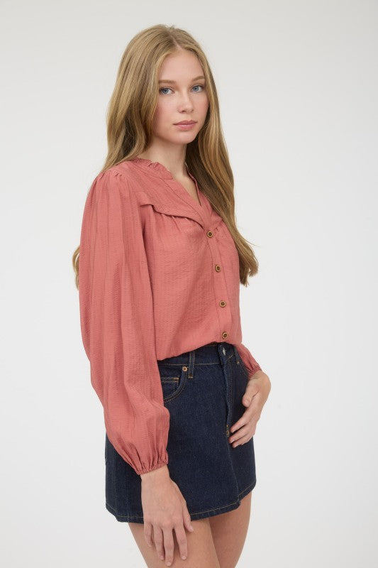 orange long sleeve button top