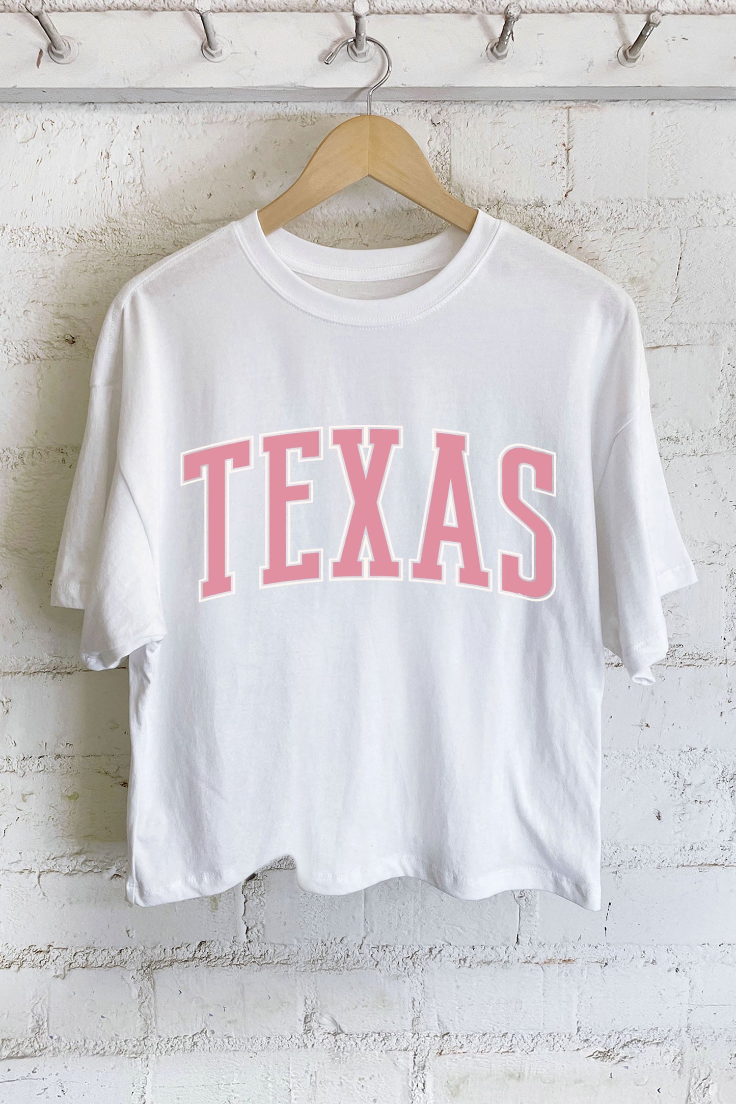 white and pink texas graphic long crop tee
