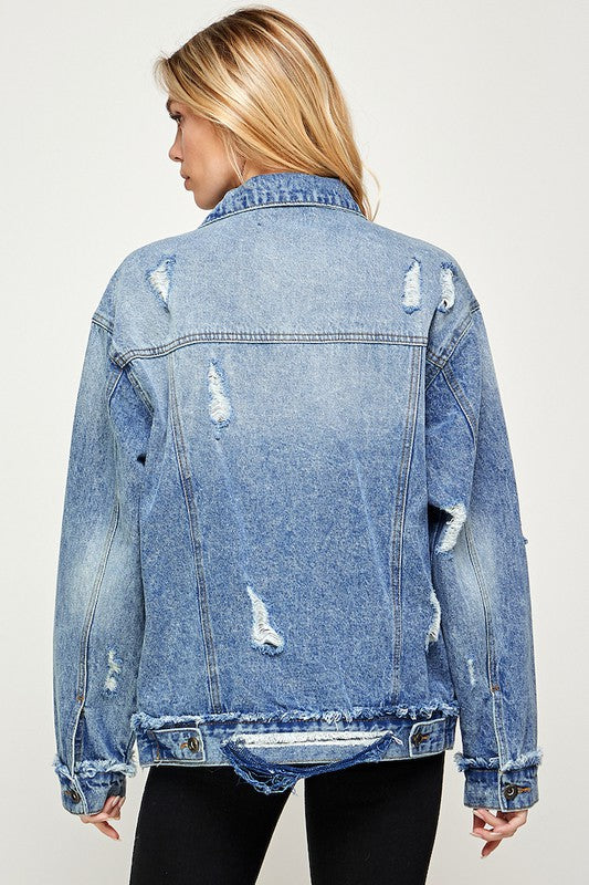 medium wash oversized distressed denim jacket