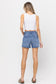 medium wash high rise long inseam denim shorts