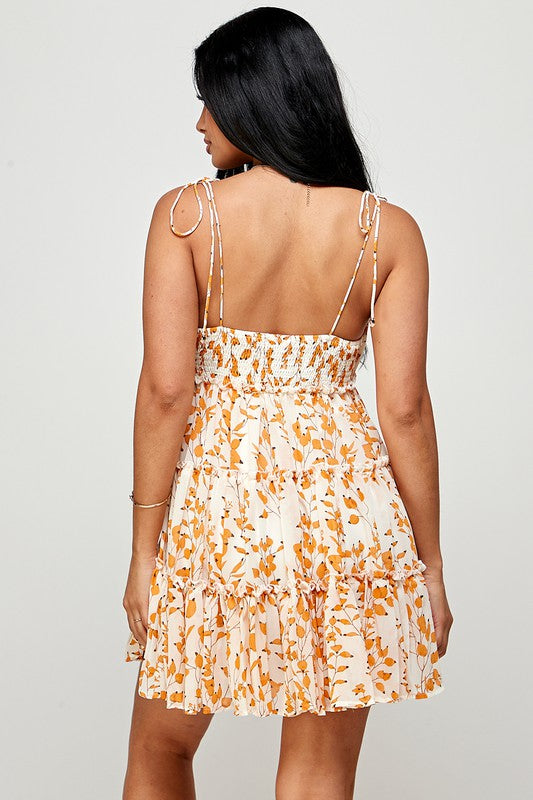 off white and orange floral sleeveless dress