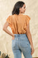 light orange flutter sleeve flowy top