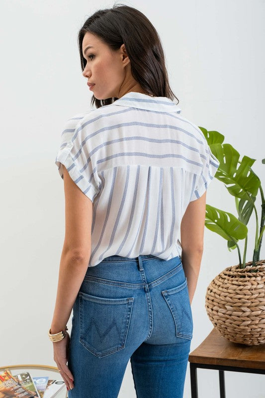 white and blue pinstripe collared shirt