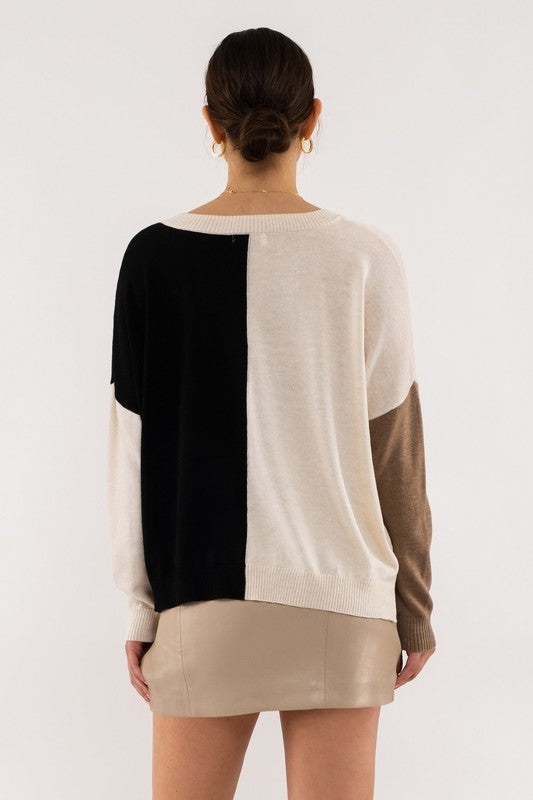 black and cream color block long sleeve top