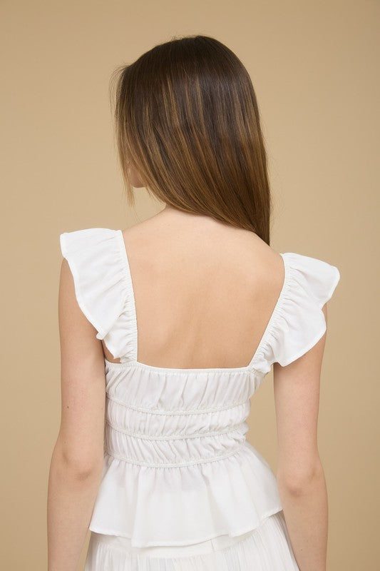 white ruffle dressy top