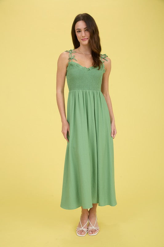 green sleeveless midi dress