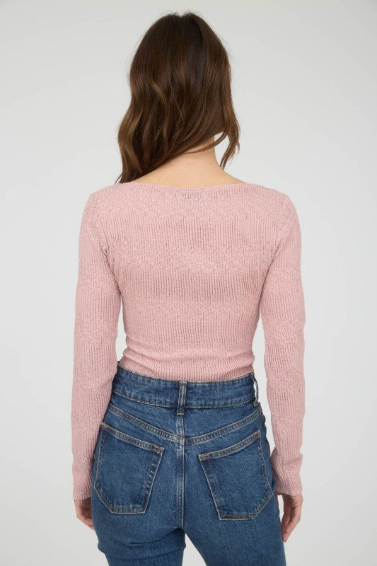 pink fitted long sleeve top