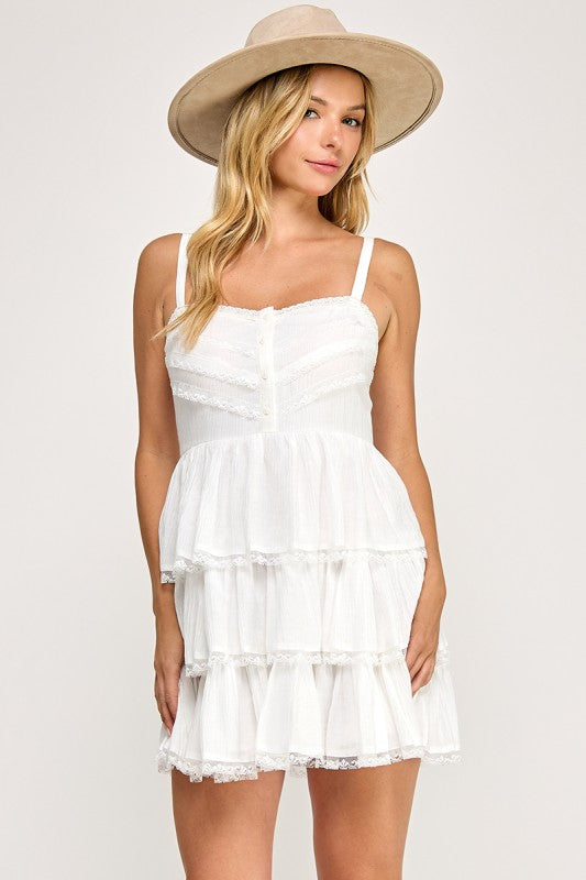 white sleeveless ruffle short dress