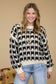 black and cream long sleeve knit sweater