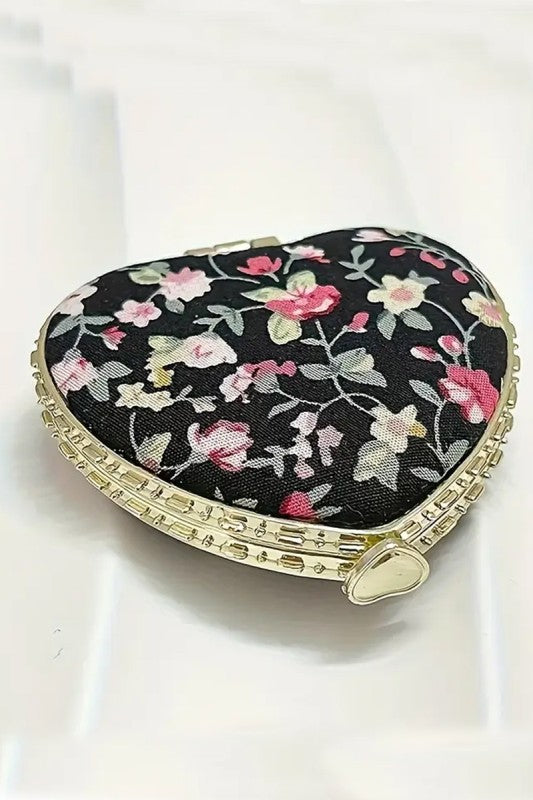 black floral hart shaped mirror