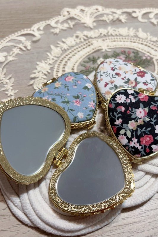 heart shaped hand mirror