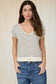 cream striped button front knit top