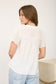 white flowy short sleeve top