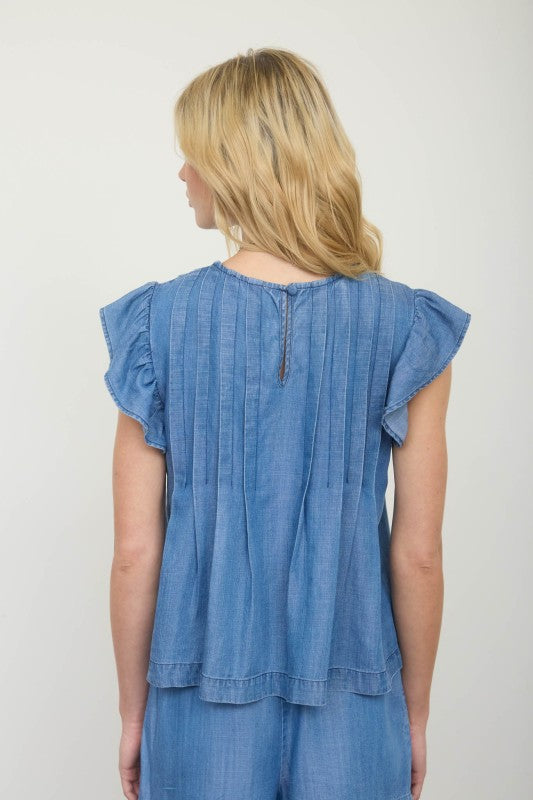 blue ruffle denim top