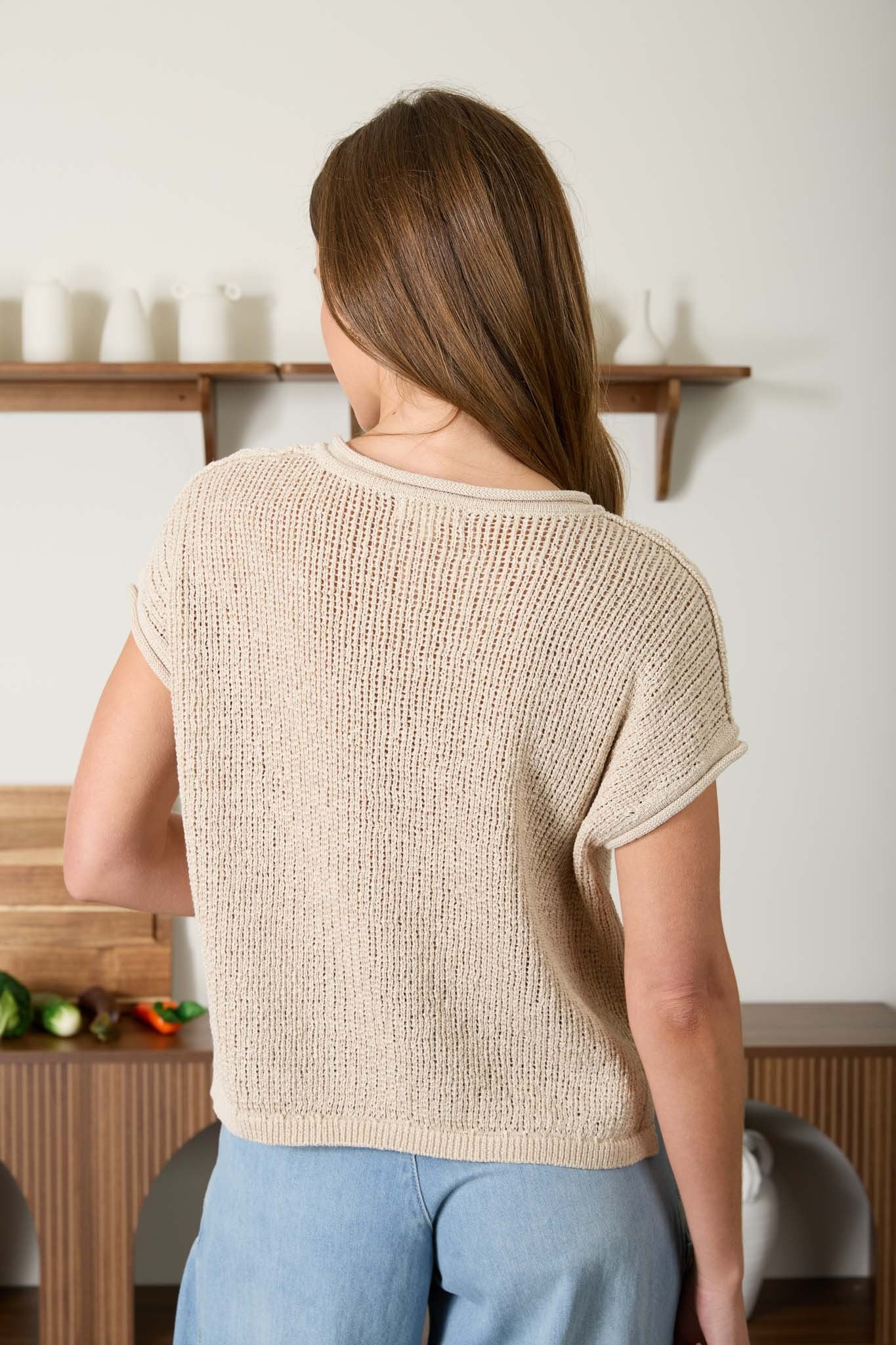 light brown knit top