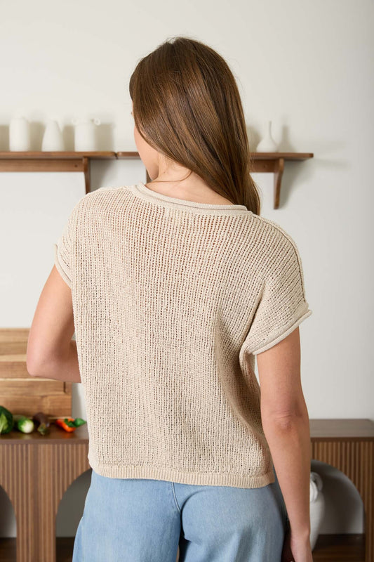 light brown knit top
