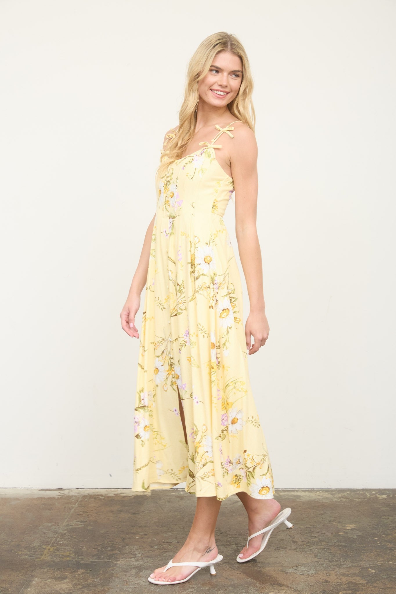 light yellow floral sleeveless midi dress