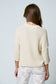 cream quarter length sleeve knit top