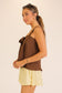 brown sleeveless top