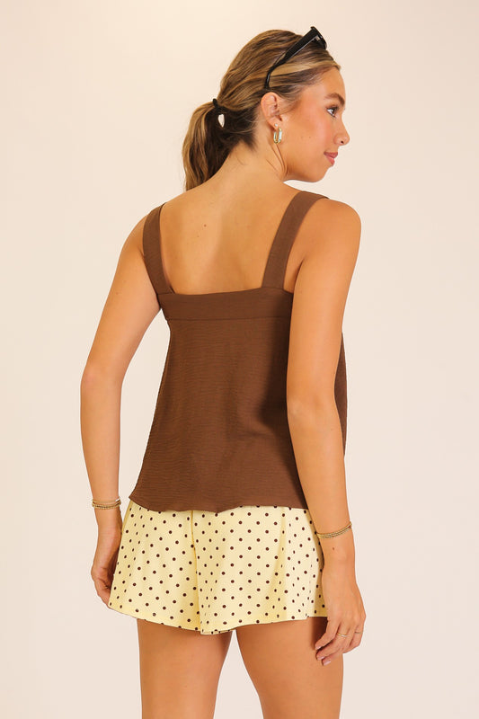 brown sleeveless top