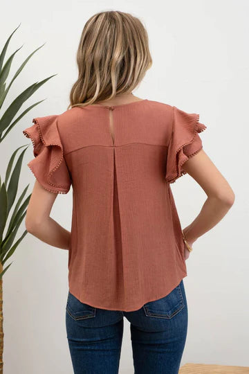 rust ruffle sleeve top