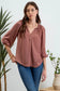 rust quarter length sleeve v neck top