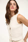 cream sleeveless knit top